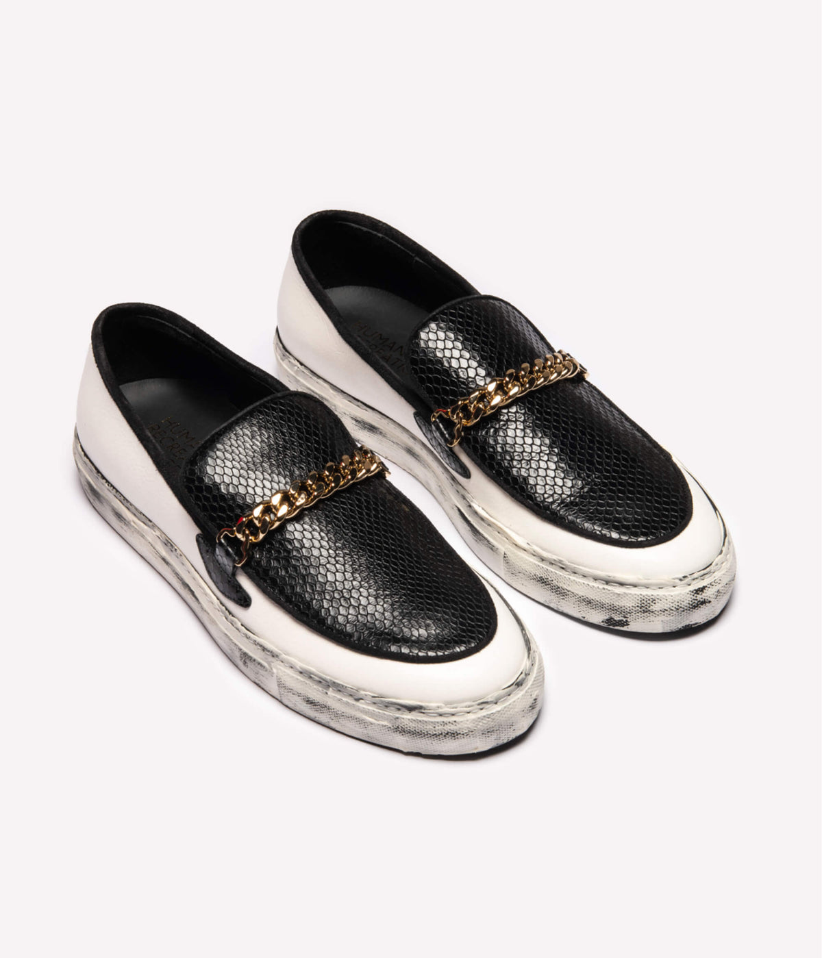 HUMAN RECREATIONAL SERVICES EL DORADO WHITE AND BLACK LOAFER WITH A CUBAN LINK CHAIN