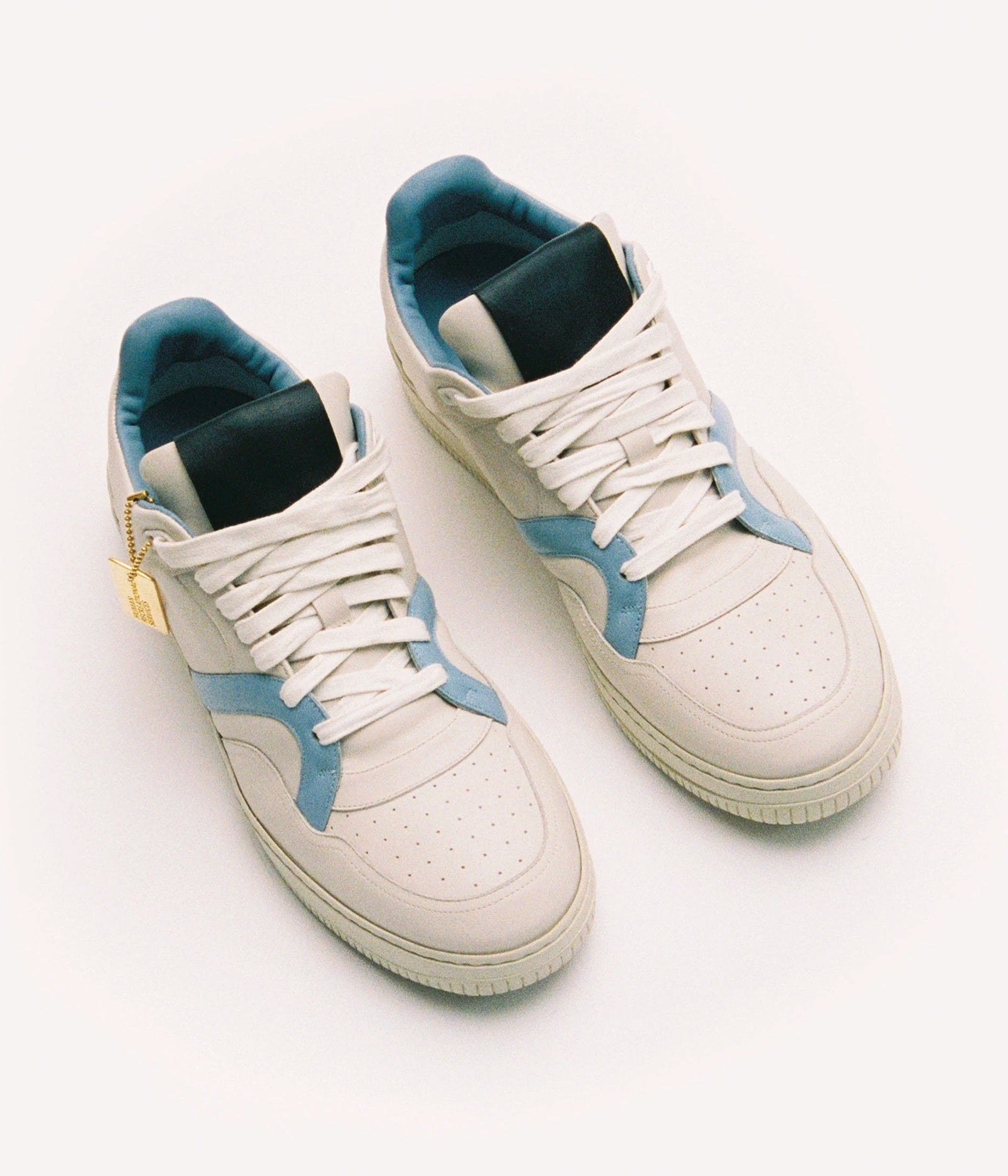 HUMAN RECREATIONAL SERVICES MONGOOSE LOW SHOE IN BONE BLUE AND BLACK MADE WITH ITALIAN CALF SKIN