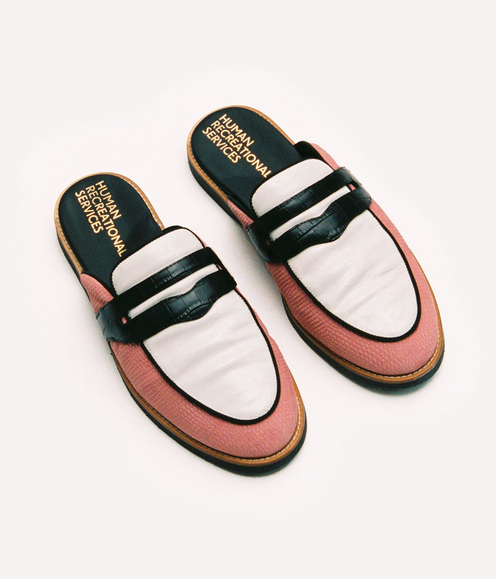 HUMAN RECREATIONAL SERVICES PALAZZO SLIPPER IN PINK BONE AND BLACK MADE WITH ITALIAN CALF SKIN
